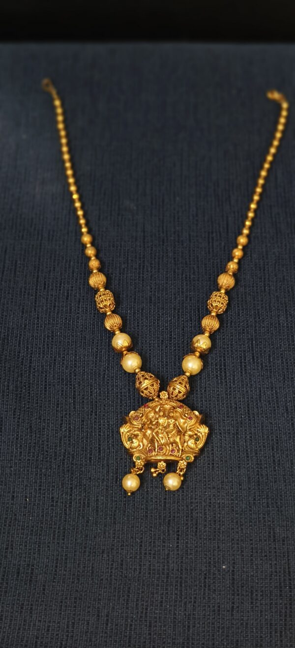 Traditional Gold Beaded Necklace with Lakshmi Pendant