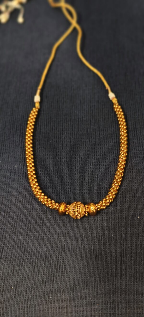 Traditional Gold Mangalsutra with Intricate Bead Design